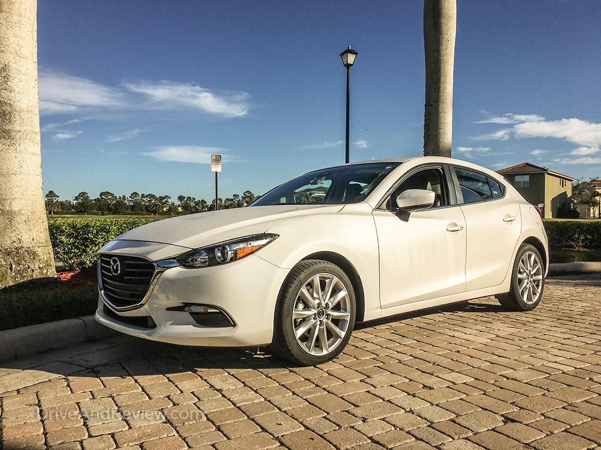 2017 white Mazda 3 hatchback